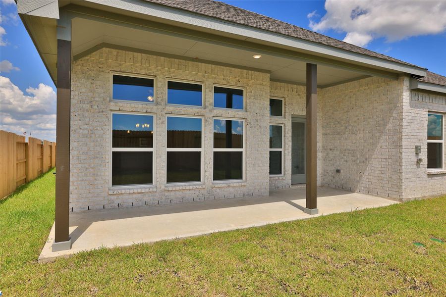 Exterior details and patio area of a home in River Ranch, Dayton (Image 3). Exterior details and patio area of a home in River Ranch, Dayton (Image 3).