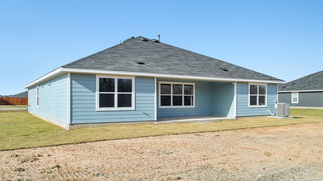 Exterior details and patio area of a home in Railhead, Cedar Creek (Image 3).