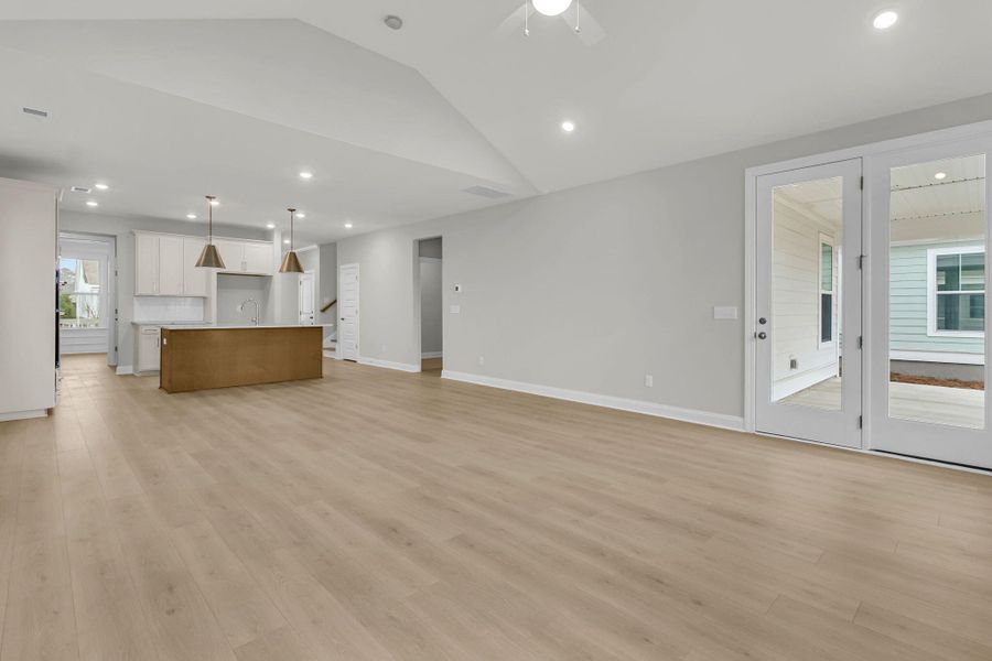 Spacious, unfurnished interior of a new home in Tidewater at Lakes of Cane Bay, Summerville (Image 32).