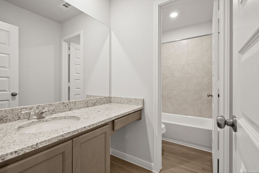 Furnished interior view inside a new home in Abbott Place, St. Hedwig (Image 7).