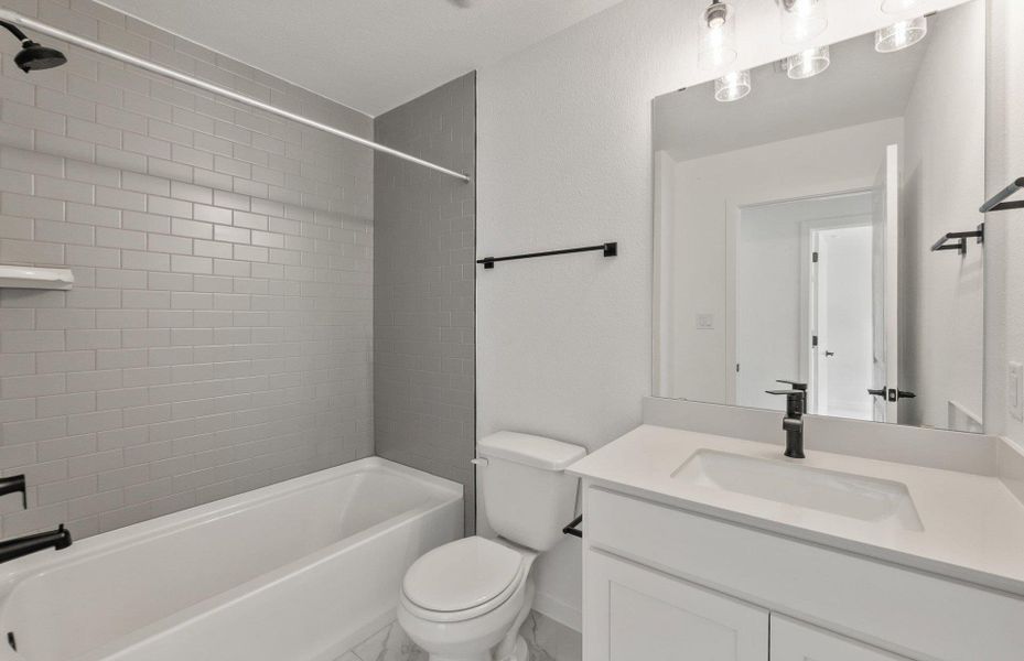 Furnished interior view inside a new home in Wolf Ranch, Georgetown (Image 8).