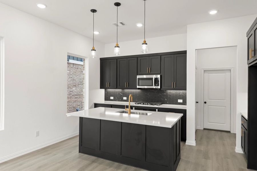 Kitchen featuring the Noir Collection Kitchen featuring the Noir Collection