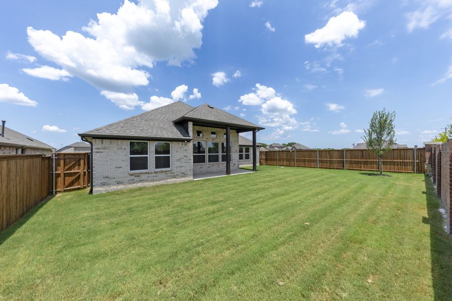 Exterior details and patio area of a home in River Ranch, Van Alstyne (Image 25). Exterior details and patio area of a home in River Ranch, Van Alstyne (Image 25).