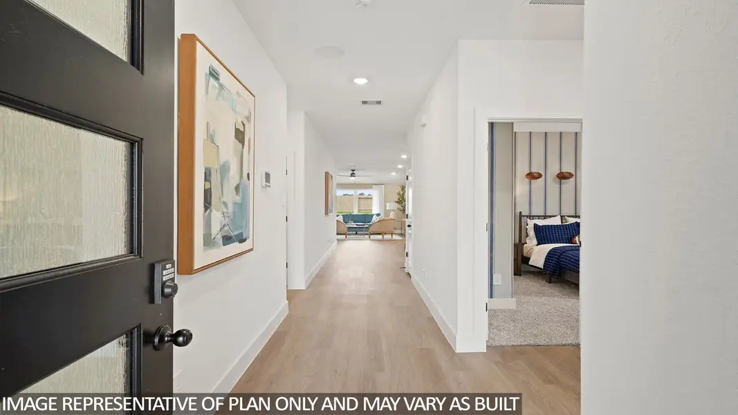 Furnished interior view inside a new home in Sunterra Lakes, Brookshire (Image 3).