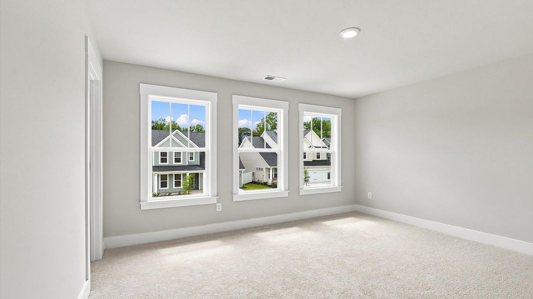 First-class secondary bedroom with comfortable carpeted flooring and generous closet space First-class secondary bedroom with comfortable carpeted flooring and generous closet space