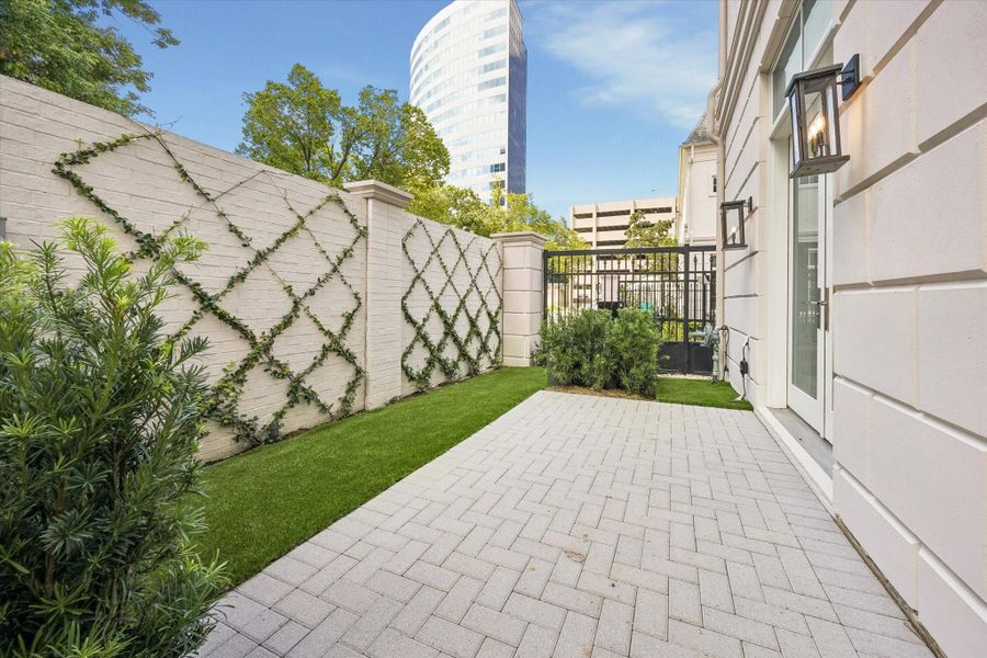 Rear patio to be equipped with a gas stub. This tranquil outdoor area is a perfect extension of your living space. A 10-foot fence provides privacy while entertaining or enjoying the yard. **Photo is of another home in the community and for information purposes only. Buyer to verify all details.** Rear patio to be equipped with a gas stub. This tranquil outdoor area is a perfect extension of your living space. A 10-foot fence provides privacy while entertaining or enjoying the yard. **Photo is of another home in the community and for information purposes only. Buyer to verify all details.**