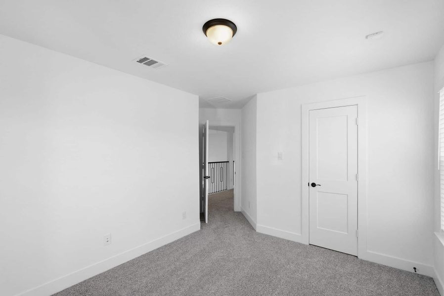 Spacious, unfurnished interior of a new home in Bridgeland, Cypress (Image 27). Spacious, unfurnished interior of a new home in Bridgeland, Cypress (Image 27).