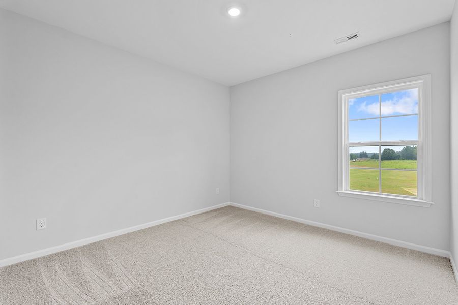 Spacious, unfurnished interior of a new home in Lilah Grove, Summerfield (Image 40).