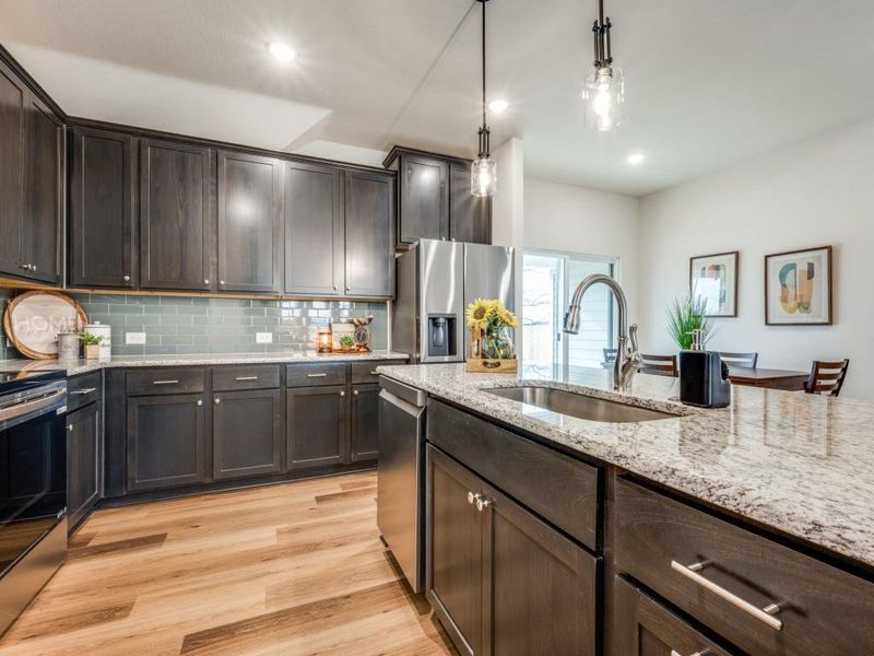 Photos shown are representative of similar construction and may include optional upgrades. Actual home may vary. Photos shown are representative of similar construction and may include optional upgrades. Actual home may vary.