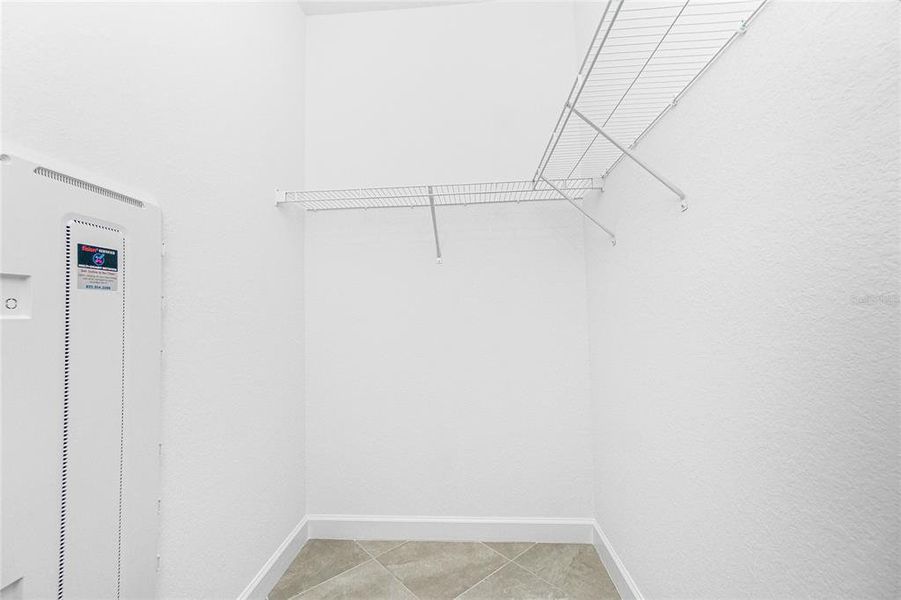 Spacious, unfurnished interior of a new home in Island Lakes at Coco Bay: Villas, Englewood (Image 29).