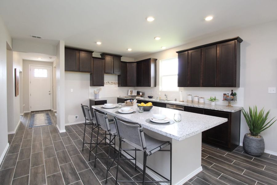 Furnished interior view inside a new home in Villas San Agustin, Laredo (Image 4).