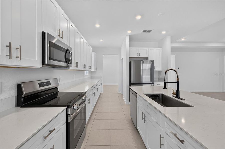 Furnished interior view inside a new home in , Apopka (Image 5).
