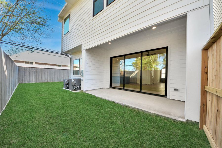 Exterior details and patio area of a home in Caywood Place, Houston (Image 3).