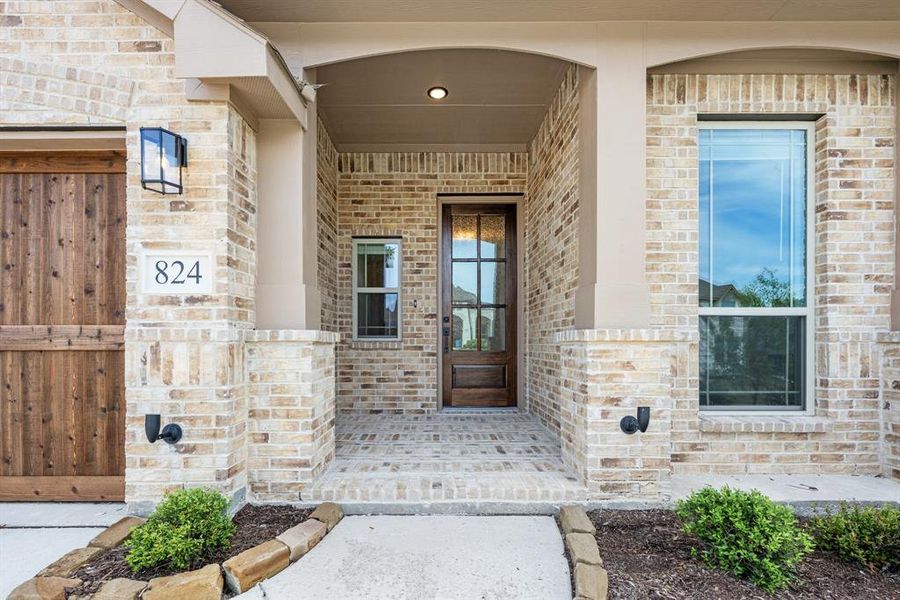 Exterior details and patio area of a home in Homestead at Daniel Farms, DeSoto (Image 25).