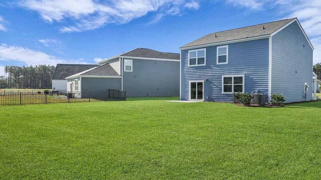 Exterior details and patio area of a home in Hillcrest, Ravenel (Image 24).