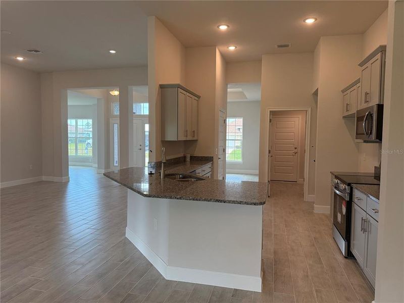 Furnished interior view inside a new home in South Gulf Cove, Port Charlotte (Image 4).