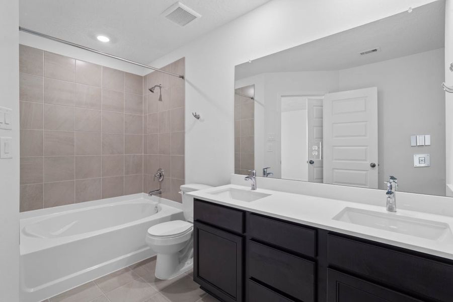 Furnished interior view inside a new home in Grace Landing, Willis (Image 7).