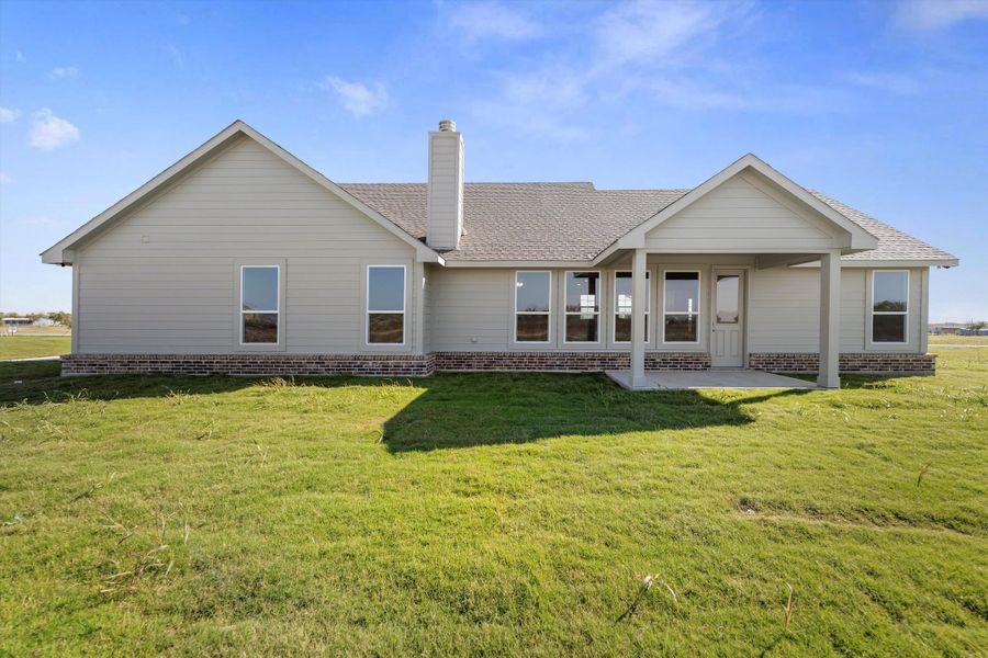 Exterior details and patio area of a home in Clear Sky Addition, Valley View (Image 29).