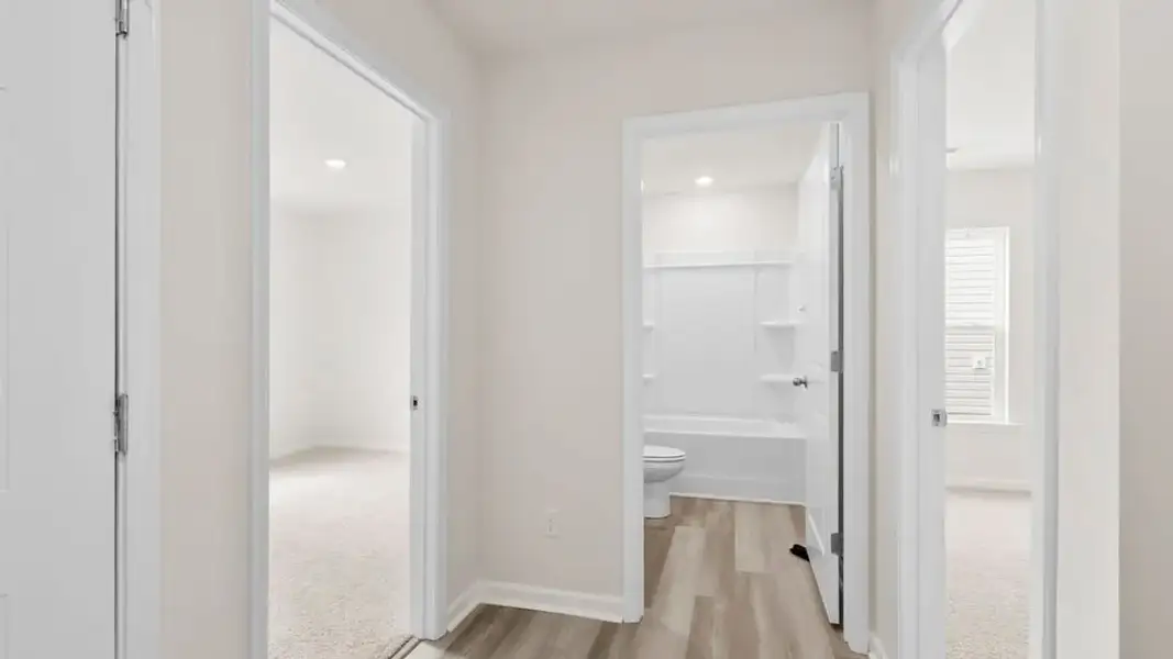 Spacious, unfurnished interior of a new home in Village Grove, Greenville (Image 19).