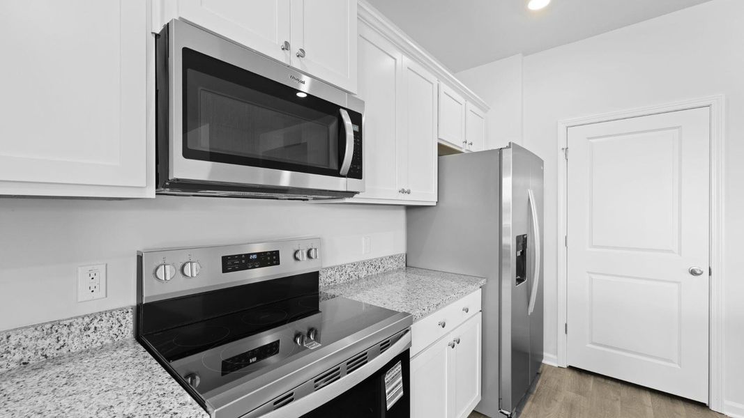 Furnished interior view inside a new home in The Ranch, Holly Hill (Image 4).