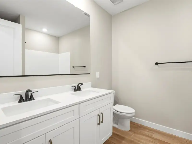 Furnished interior view inside a new home in Legacy Place, Glendale (Image 6).