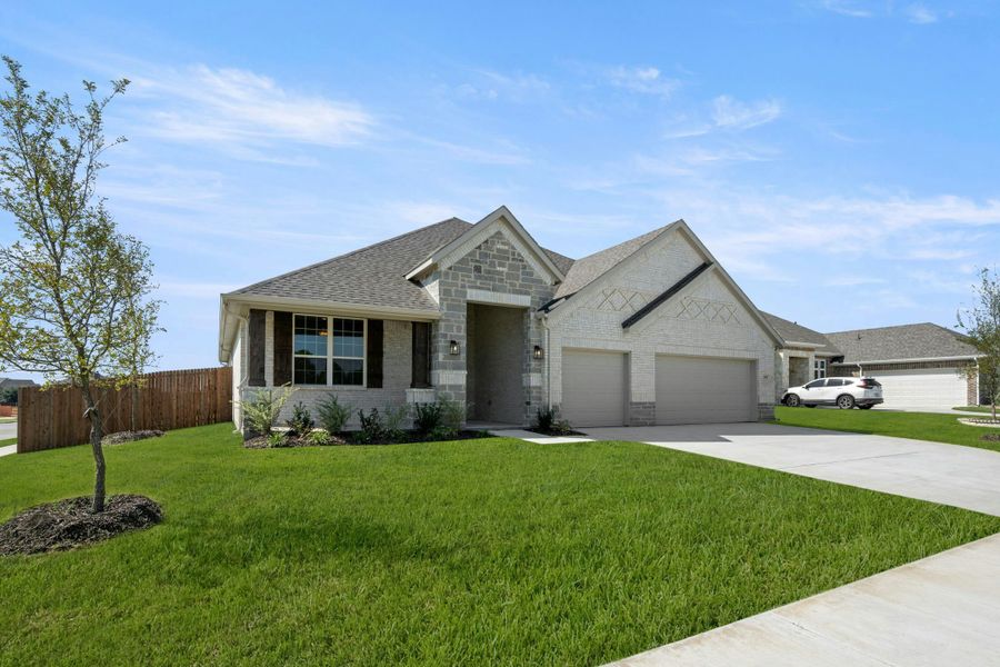 Representative exterior photo of a completed home built from the Garner by Kindred Homes in Westside Preserve, Midlothian, TX (Image 23).