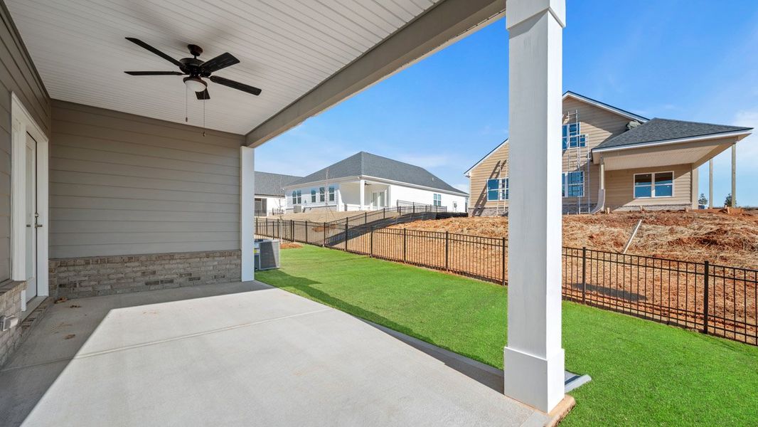 Exterior details and patio area of a home in Oak Ridge Meadows, Locust Grove (Image 2).