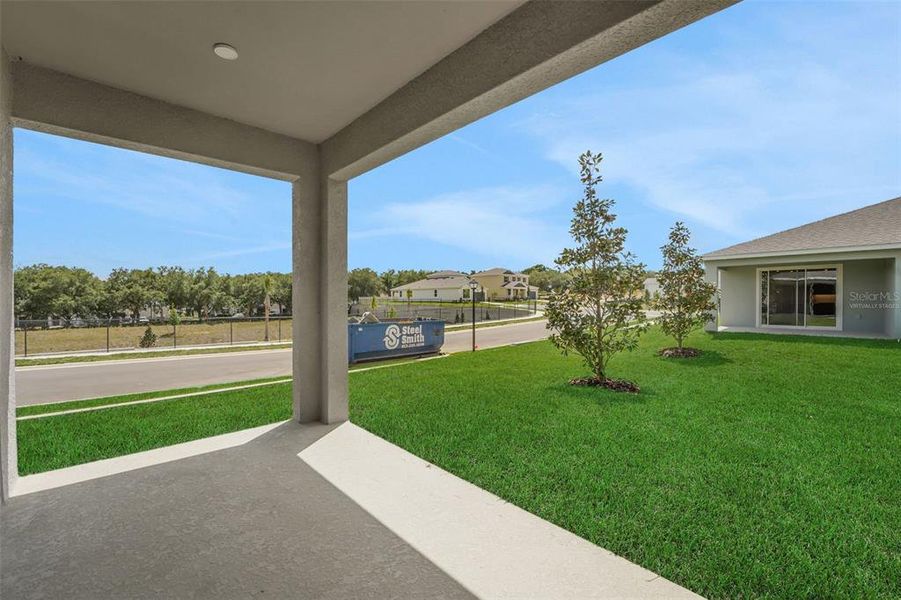 Exterior details and patio area of a home in Tuscan Hills, Dade City (Image 25).