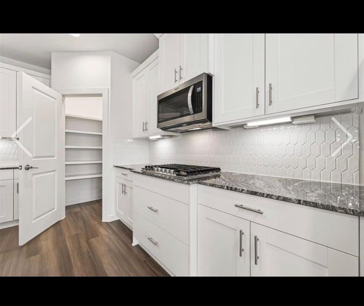 Furnished interior view inside a new home in Harvest Green, Richmond (Image 5).