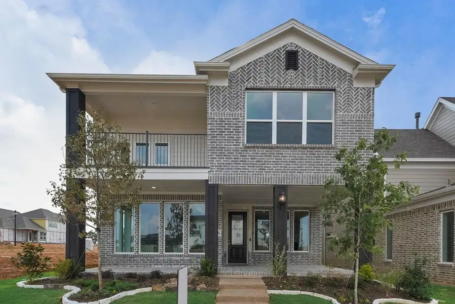 Representative exterior photo of a completed home built from the Royal Willow by Grand Homes in Trails at Cottonwood Creek, Rowlett, TX (Image 18). Representative exterior photo of a completed home built from the Royal Willow by Grand Homes in Trails at Cottonwood Creek, Rowlett, TX (Image 18).