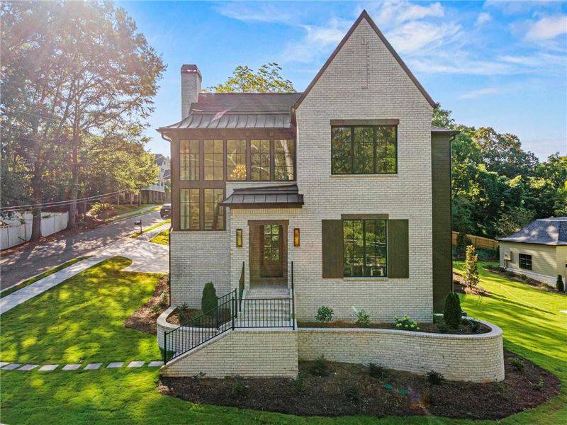 Front exterior of a new home in , Roswell, GA, highlighting curb appeal (Image 31). Front exterior of a new home in , Roswell, GA, highlighting curb appeal (Image 31).
