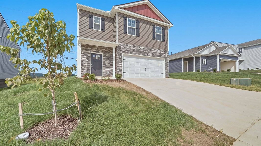 Front exterior of a new home in Fieldcrest Acres, Blountville, TN, highlighting curb appeal (Image 2).