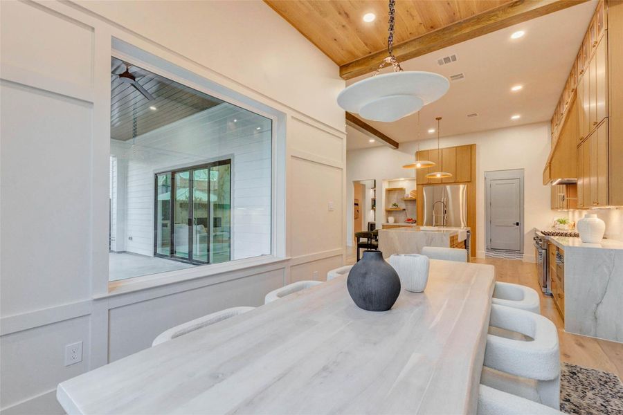 A seamless transition from the dining room to kitchen reveals open-concept living at its finest.