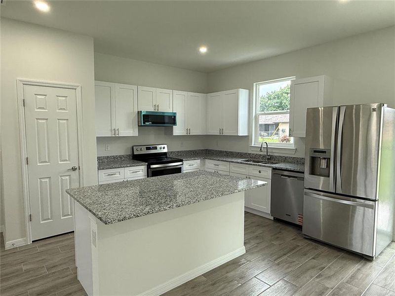 Furnished interior view inside a new home in , Port Charlotte (Image 12). Furnished interior view inside a new home in , Port Charlotte (Image 12).