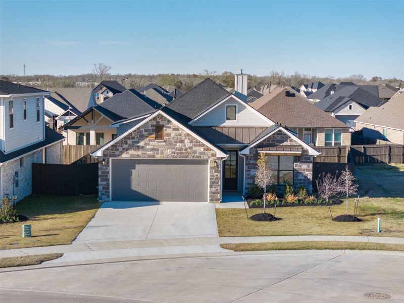 Front exterior of a new home in , Bryan, TX, highlighting curb appeal (Image 26).