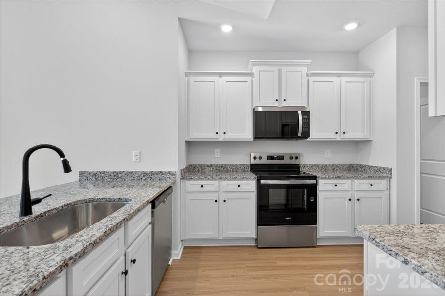 Furnished interior view inside a new home in Stagecoach Station, Gastonia (Image 4).