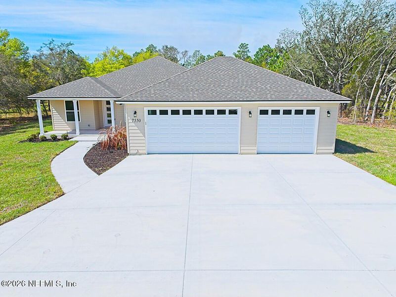 Front exterior of a new home in , Keystone Heights, FL, highlighting curb appeal (Image 2). Front exterior of a new home in , Keystone Heights, FL, highlighting curb appeal (Image 2).