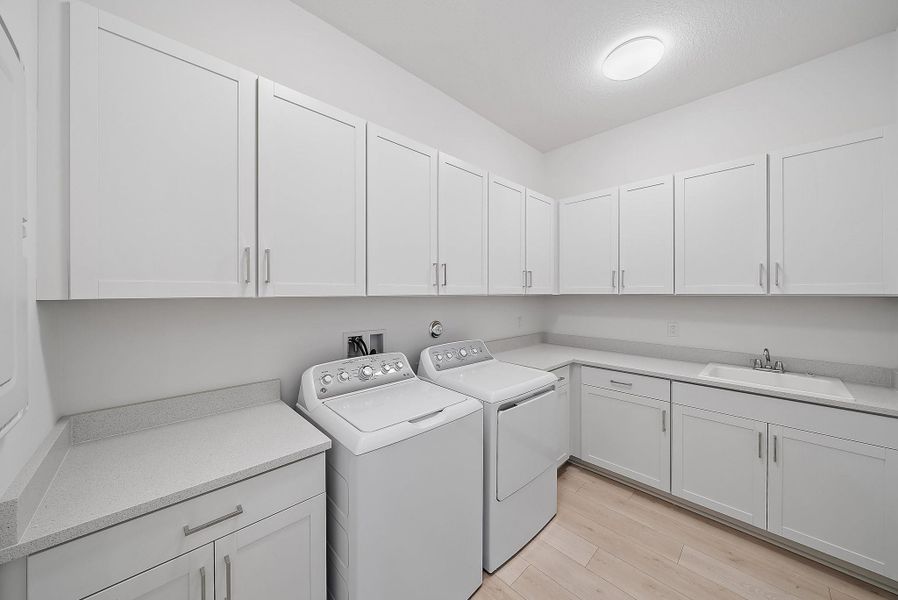 Furnished interior view inside a new home in L'Ambiance at Avenir, Palm Beach Gardens (Image 5).