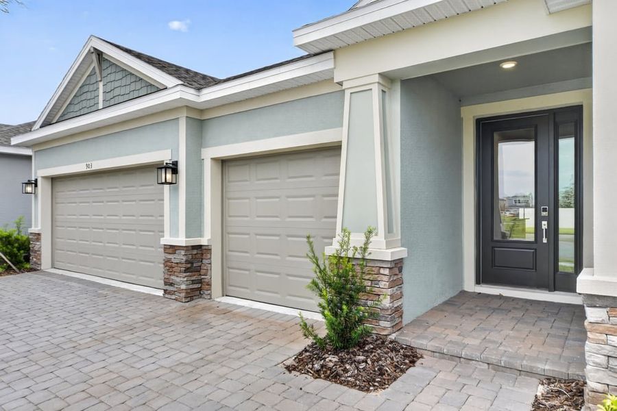 Exterior details and patio area of a home in Center Lake Ranch Community Group Page, St. Cloud (Image 22).