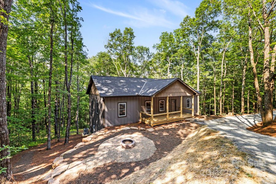 Front exterior of a new home in , Lake Toxaway, NC, highlighting curb appeal (Image 1). Front exterior of a new home in , Lake Toxaway, NC, highlighting curb appeal (Image 1).