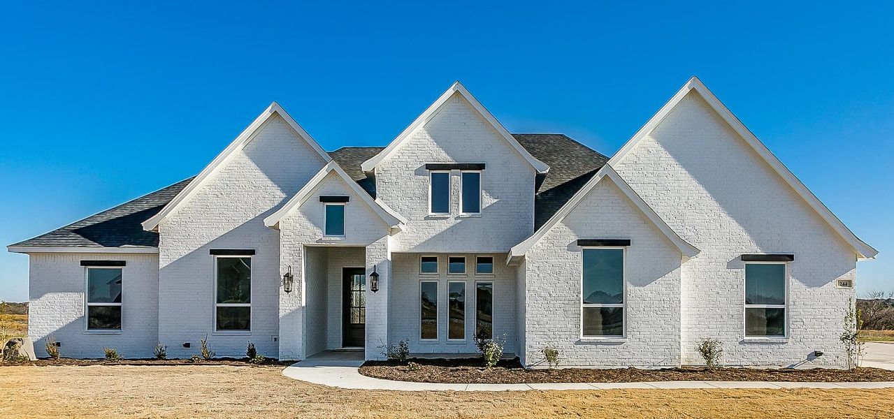 Representative exterior photo of a completed home built from the 105-2496-0619 by Abba River Homes in Stanford Estates, Springtown, TX (Image 1). Representative exterior photo of a completed home built from the 105-2496-0619 by Abba River Homes in Stanford Estates, Springtown, TX (Image 1).