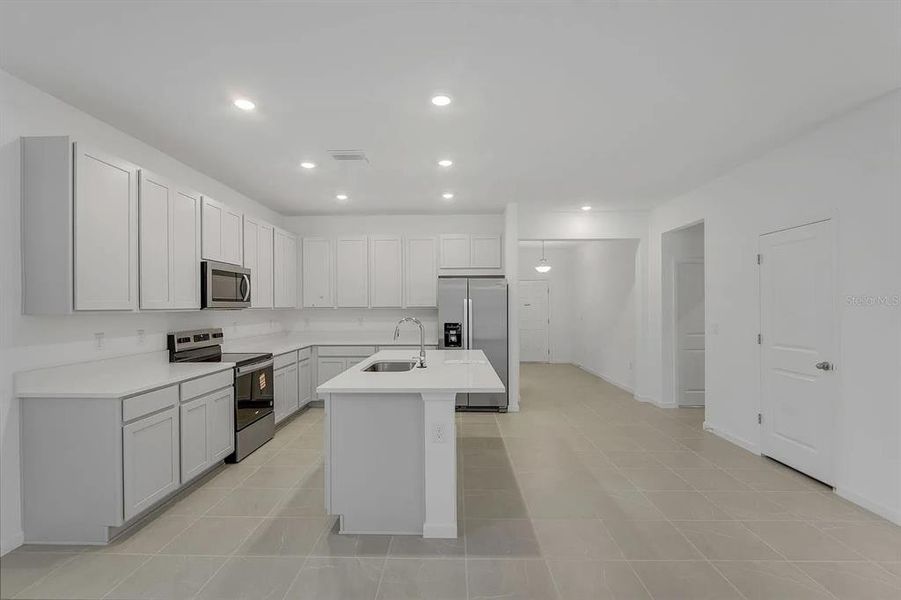 Furnished interior view inside a new home in Cypress Park Estates, Haines City (Image 11).