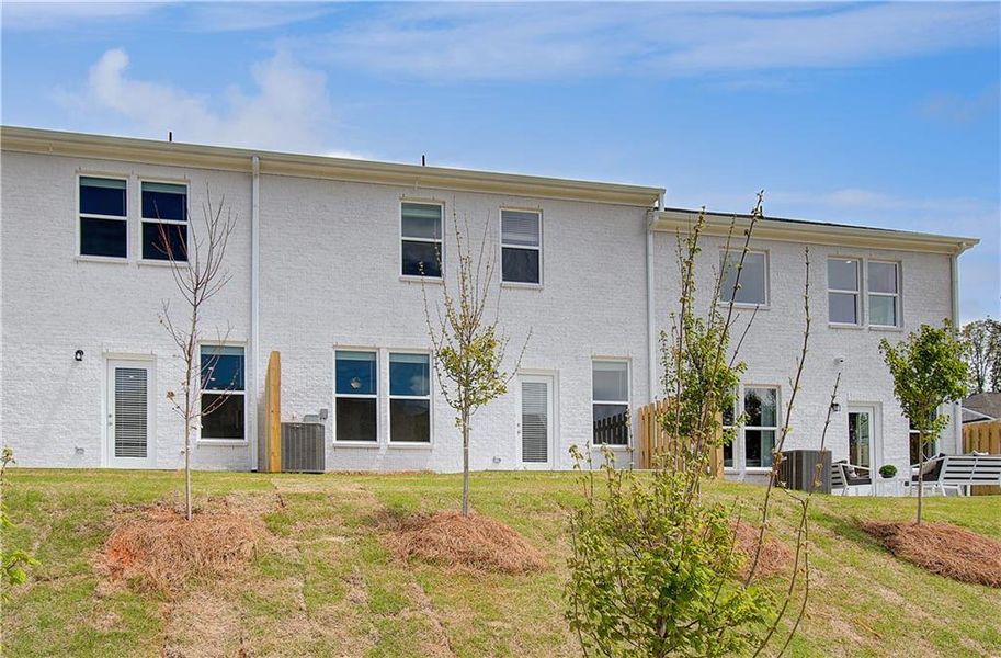 Exterior details and patio area of a home in Bowers Farm, McDonough (Image 18).