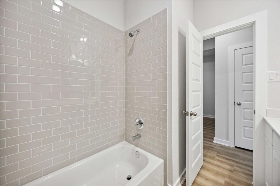 Furnished interior view inside a new home in Deer Pines, Conroe (Image 3).