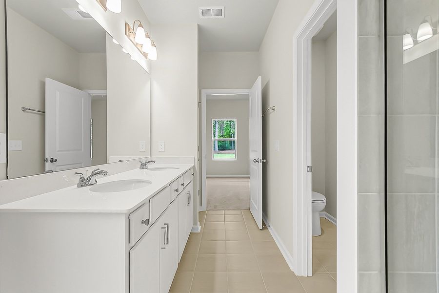 Furnished interior view inside a new home in Fairway Woods at Wyboo, Manning (Image 12).