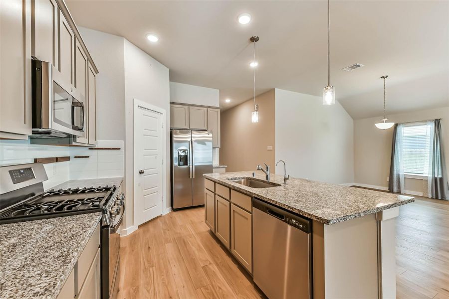 Furnished interior view inside a new home in Mustang Crossing, Alvin (Image 4).
