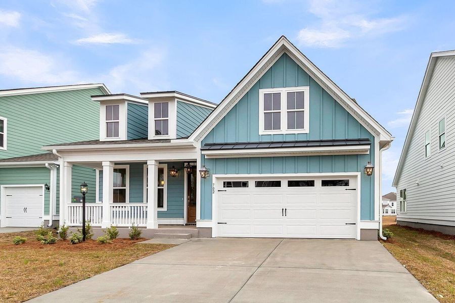 Front exterior of a new home in Kings River Preserve, Hollywood, SC, highlighting curb appeal (Image 1). Front exterior of a new home in Kings River Preserve, Hollywood, SC, highlighting curb appeal (Image 1).