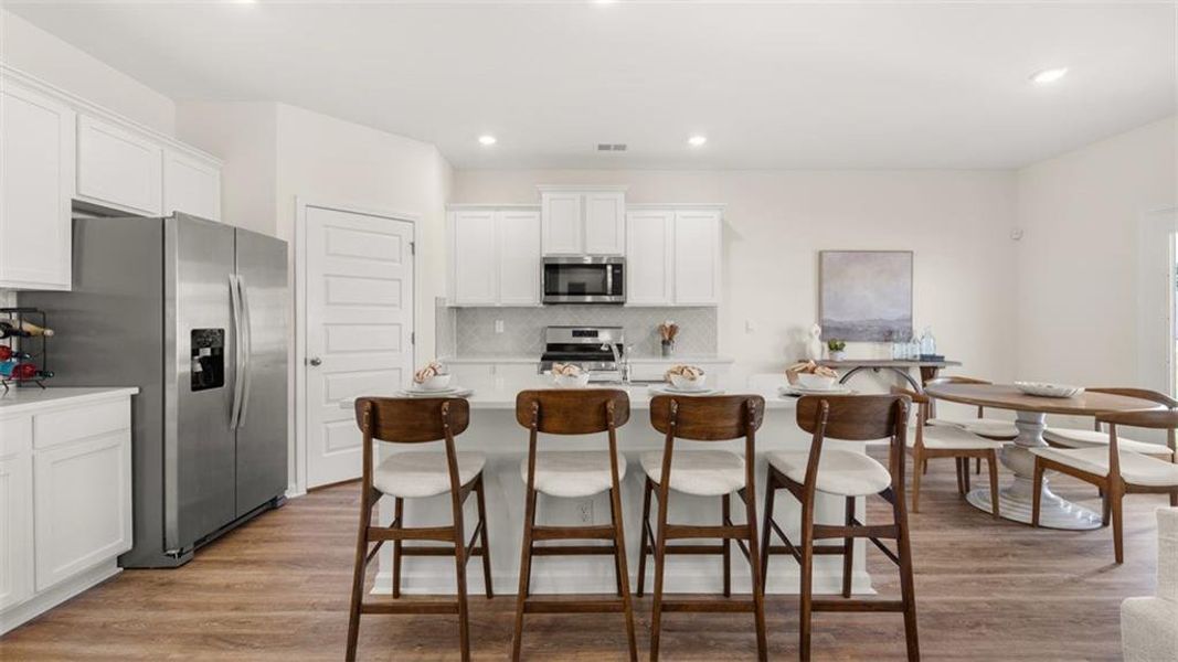 Furnished interior view inside a new home in Preserve at Dove Creek, Statham (Image 9).
