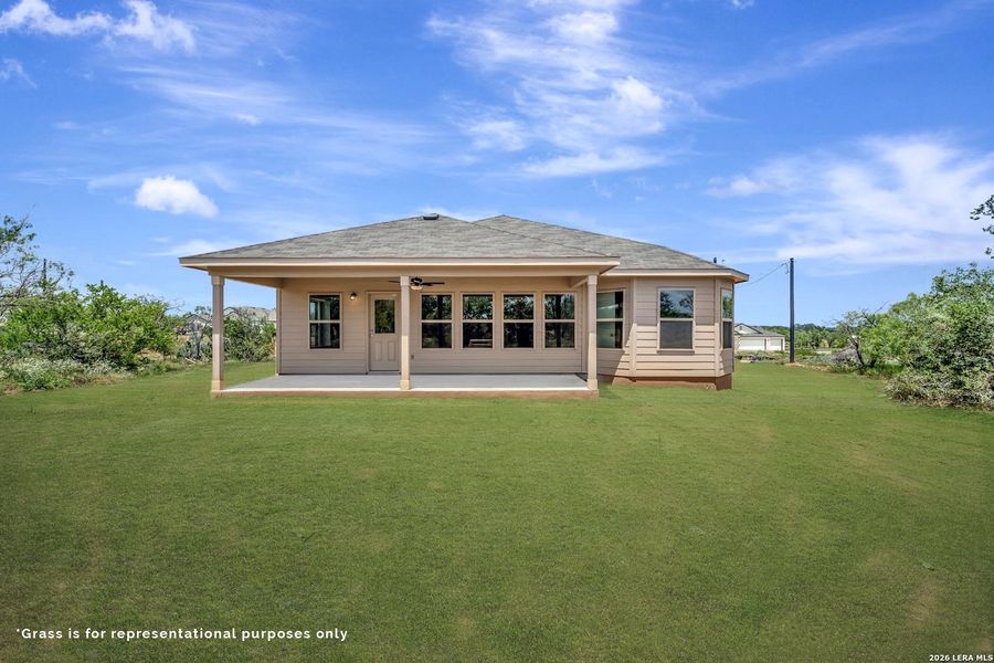 Exterior details and patio area of a home in Chaparral Ranch, Floresville (Image 3).