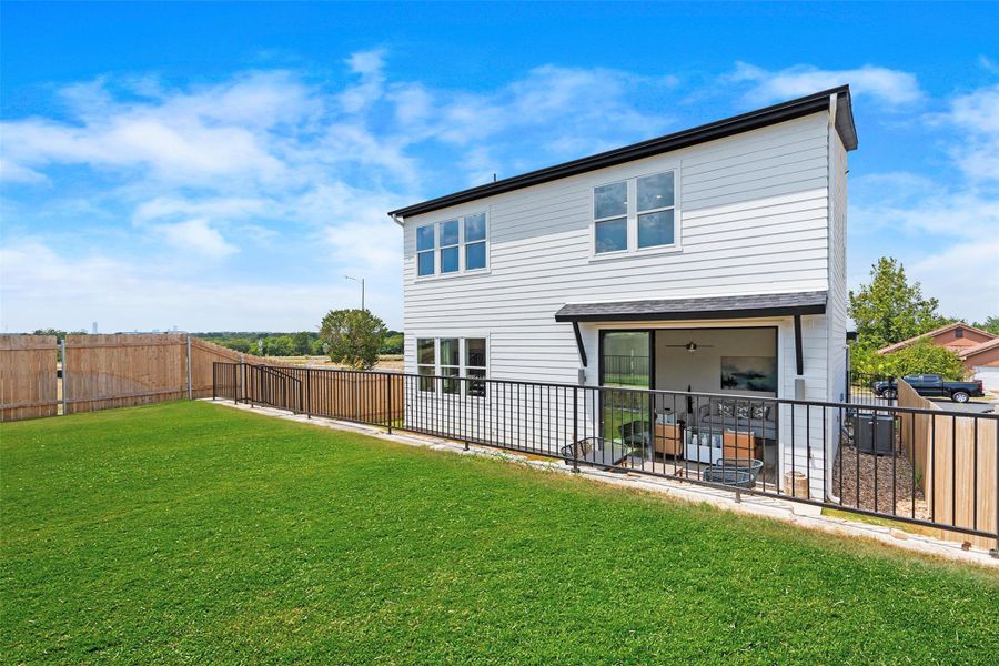 Front exterior of a new home in Agave, Austin, TX, highlighting curb appeal (Image 1).